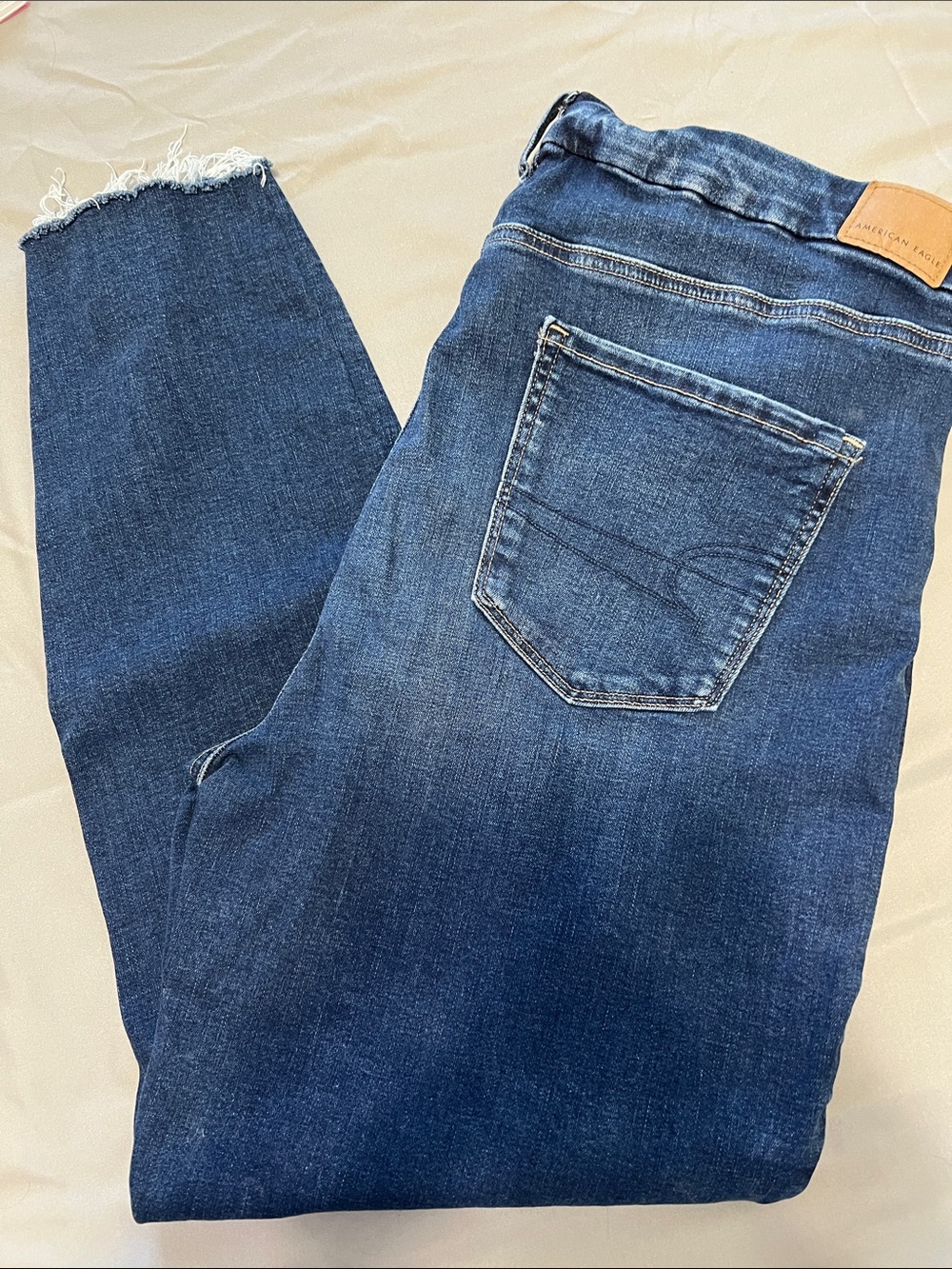 American Eagle Outfitters Indigo Frayed-Hem Ankle Skinny Jeans